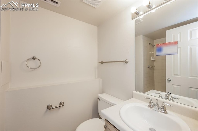 5805 Dutchess Dr, Colorado Springs, CO 80923 - full bathroom with toilet, a shower, and vanity