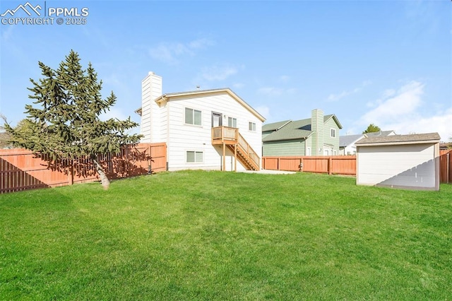 5805 Dutchess Dr, Colorado Springs, CO 80923 - back of house with stairs, a chimney, an outdoor structure, and a shed