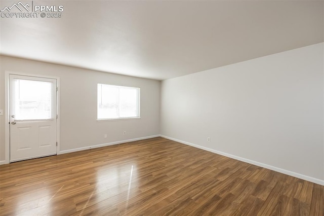 5805 Dutchess Dr, Colorado Springs, CO 80923 - unfurnished room with baseboards and wood finished floors