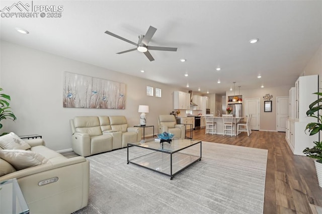 5932 Torrisdale Vw, Colorado Springs, CO 80927 - living area featuring a ceiling fan, wood finished floors, recessed lighting, and baseboards