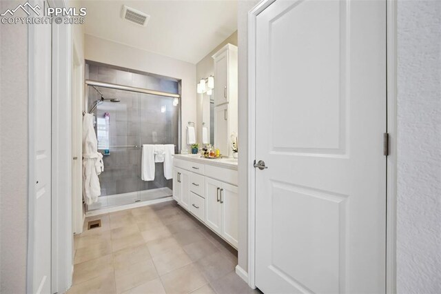 5932 Torrisdale Vw, Colorado Springs, CO 80927 - full bath featuring a stall shower, vanity, and tile patterned floors