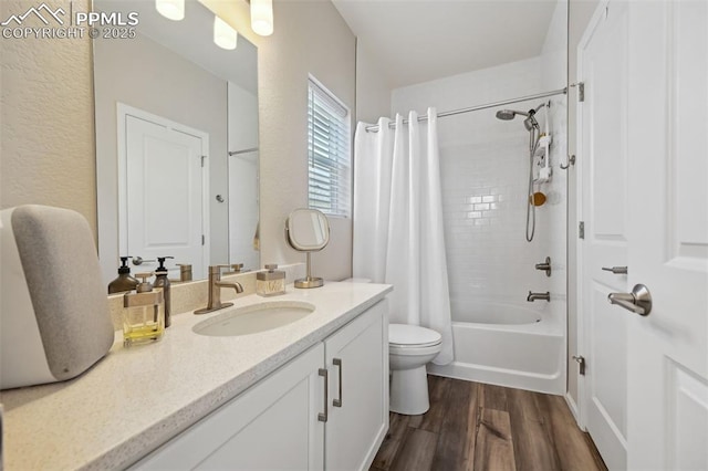 5932 Torrisdale Vw, Colorado Springs, CO 80927 - bathroom featuring wood finished floors, vanity, toilet, and shower / tub combo