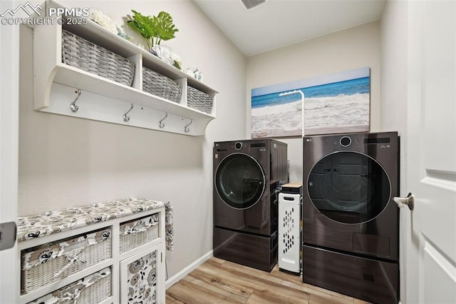 5932 Torrisdale Vw, Colorado Springs, CO 80927 - washroom with separate washer and dryer, light wood-style flooring, and baseboards