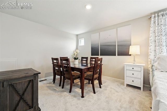5932 Torrisdale Vw, Colorado Springs, CO 80927 - dining space with baseboards, light colored carpet, and recessed lighting