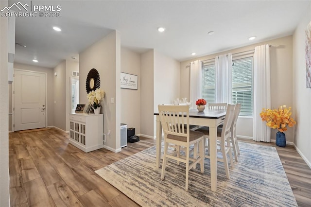 5932 Torrisdale Vw, Colorado Springs, CO 80927 - dining space with wood finished floors, baseboards, and recessed lighting