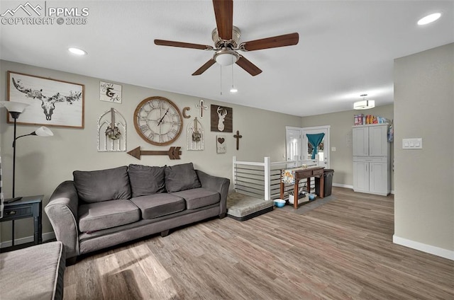 1033 Mt Werner Cir, Colorado Springs, CO 80905 - living room featuring a ceiling fan, baseboards, light wood-style floors, and recessed lighting