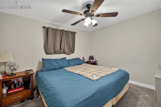 1033 Mt Werner Cir, Colorado Springs, CO 80905 - bedroom with carpet, baseboards, and ceiling fan