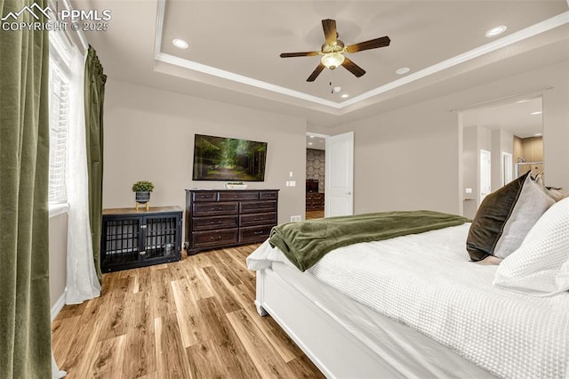 10282 Mt Lincoln Dr, Peyton, CO 80831 - bedroom with a tray ceiling, wood finished floors, recessed lighting, baseboards, and crown molding