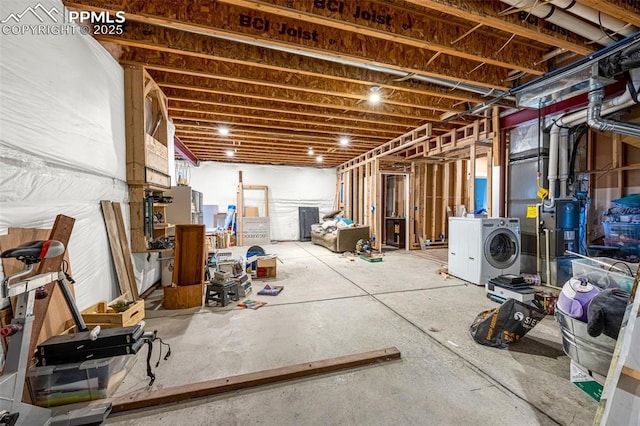 10282 Mt Lincoln Dr, Peyton, CO 80831 - unfinished below grade area with washing machine and clothes dryer