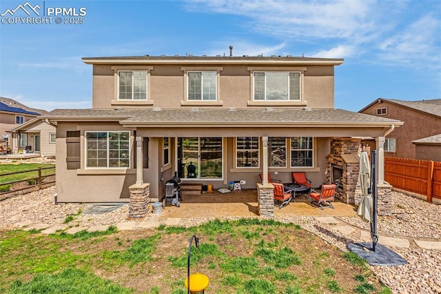 10282 Mt Lincoln Dr, Peyton, CO 80831 - rear view of house with a fenced backyard, a patio area, and stucco siding