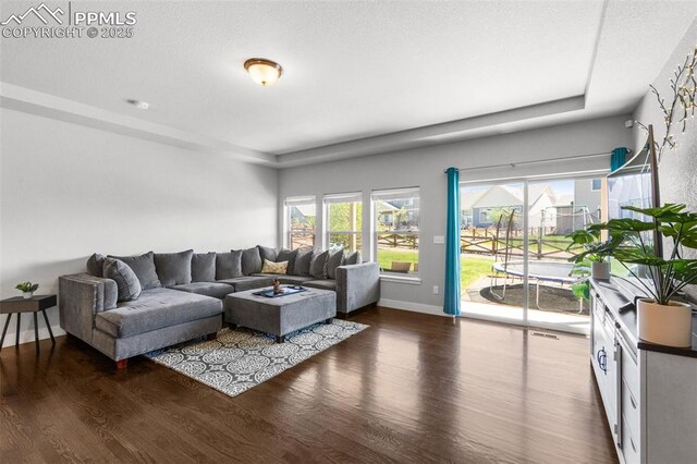 8674 Tranquil Knoll Ln, Colorado Springs, CO 80927 - living area with wood finished floors and baseboards