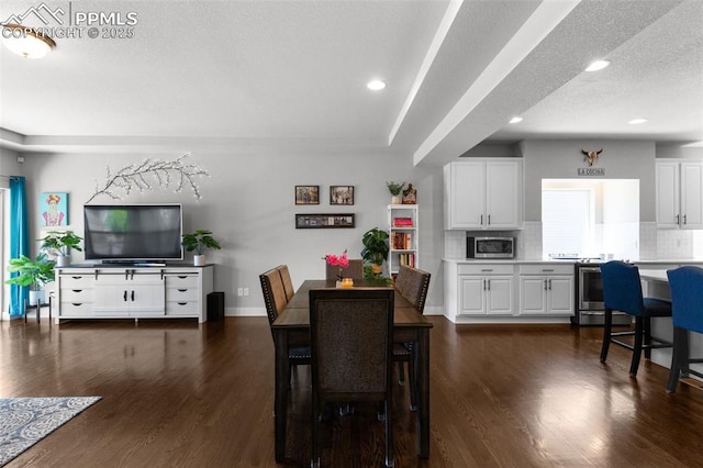 8674 Tranquil Knoll Ln, Colorado Springs, CO 80927 - dining area featuring dark wood-type flooring, recessed lighting, a textured ceiling, and baseboards