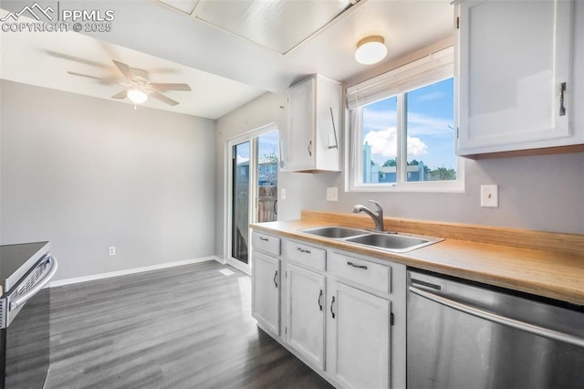 1223 Soaring Eagle Dr, Colorado Springs, CO 80915 - kitchen with appliances with stainless steel finishes, light countertops, a ceiling fan, dark wood finished floors, and a sink