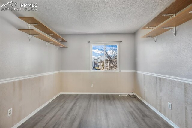 1223 Soaring Eagle Dr, Colorado Springs, CO 80915 - spacious closet with wood finished floors