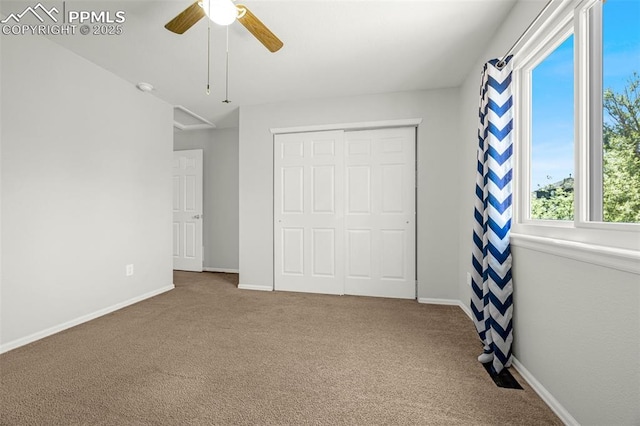 8290 Meadowcrest Dr, Fountain, CO 80817 - unfurnished bedroom featuring carpet, a closet, baseboards, and ceiling fan