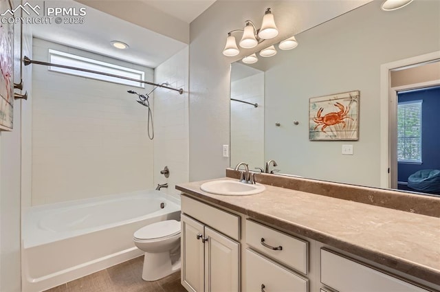 7225 Horizon Wood Ln, Colorado Springs, CO 80927 - bathroom featuring healthy amount of natural light, vanity, tub / shower combination, and toilet
