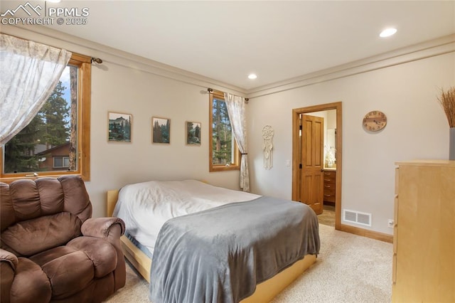 1230 Cottontail Trl, Woodland Park, CO 80863 - bedroom featuring light colored carpet, recessed lighting, baseboards, and ensuite bathroom