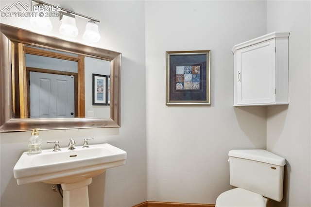 1230 Cottontail Trl, Woodland Park, CO 80863 - half bathroom featuring a sink and toilet