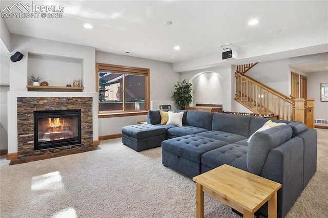 1230 Cottontail Trl, Woodland Park, CO 80863 - living room with carpet, stairway, a stone fireplace, baseboards, and recessed lighting