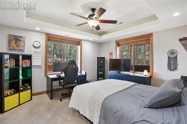 1230 Cottontail Trl, Woodland Park, CO 80863 - carpeted bedroom featuring a raised ceiling, an office area, recessed lighting, baseboards, and a ceiling fan