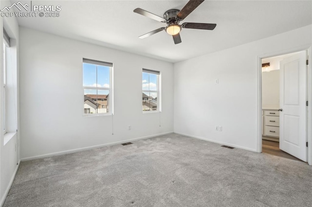 1145 Ibex Dr, Severance, CO 80550 - unfurnished bedroom featuring carpet, baseboards, ensuite bath, and a ceiling fan