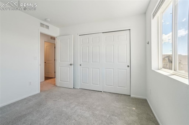 1145 Ibex Dr, Severance, CO 80550 - unfurnished bedroom with carpet flooring, baseboards, and a closet