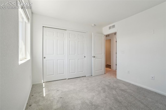 1145 Ibex Dr, Severance, CO 80550 - unfurnished bedroom featuring carpet, baseboards, and a closet
