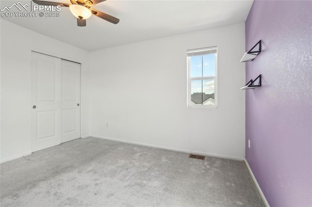 1145 Ibex Dr, Severance, CO 80550 - unfurnished bedroom featuring carpet floors, a closet, baseboards, and a ceiling fan