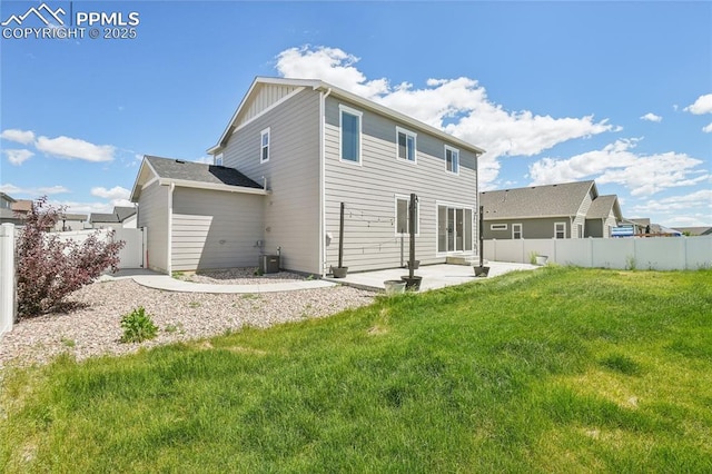 1145 Ibex Dr, Severance, CO 80550 - rear view of house featuring a patio area, central AC, and board and batten siding