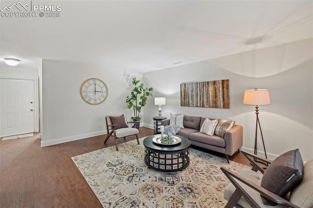 6947 Gayle Lyn Ln, Colorado Springs, CO 80919 - living room featuring baseboards and wood finished floors
