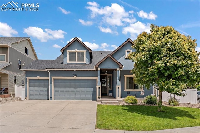 7890 Treehouse Ter, Fountain, CO 80817 - view of front of house featuring driveway, a front yard, stucco siding, a shingled roof, and an attached garage