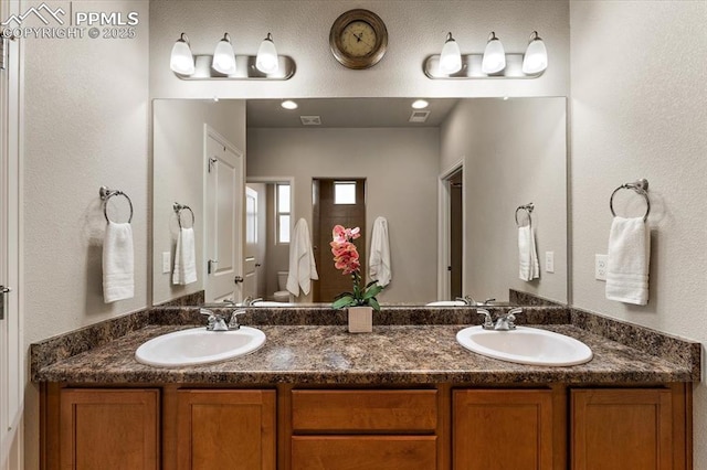 7890 Treehouse Ter, Fountain, CO 80817 - full bathroom featuring double vanity