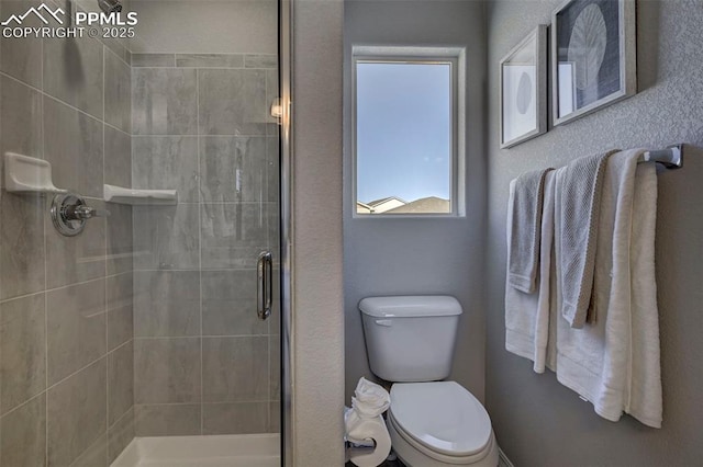7371 Cornice Pt, Colorado Springs, CO 80923 - full bath with a shower stall and toilet