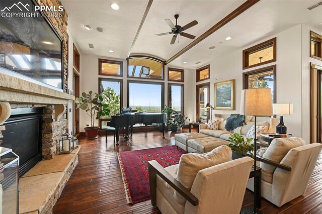 1624 Oakmoor Hts, Colorado Springs, CO 80906 - living area featuring hardwood / wood-style floors, a stone fireplace, ceiling fan, and recessed lighting