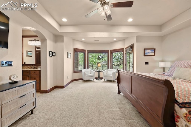 1624 Oakmoor Hts, Colorado Springs, CO 80906 - bedroom with light colored carpet, baseboards, arched walkways, recessed lighting, and a raised ceiling