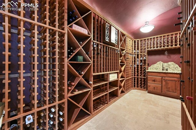 1624 Oakmoor Hts, Colorado Springs, CO 80906 - wine room with stone finish floors