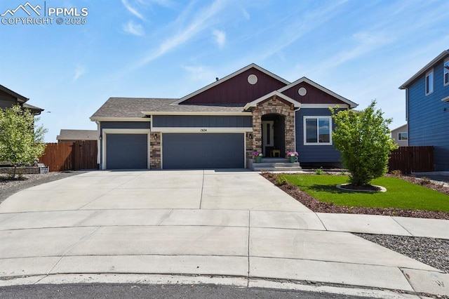 13124 Park Meadows Dr, Peyton, CO 80831 - craftsman inspired home with a garage, fence, stone siding, concrete driveway, and board and batten siding