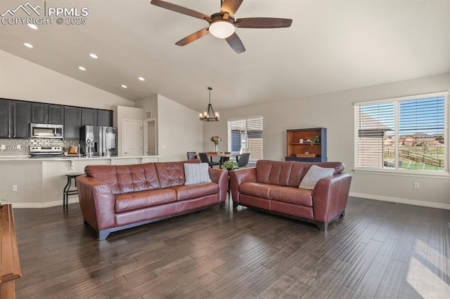 13124 Park Meadows Dr, Peyton, CO 80831 - living area with vaulted ceiling, a chandelier, dark wood-type flooring, a ceiling fan, and recessed lighting
