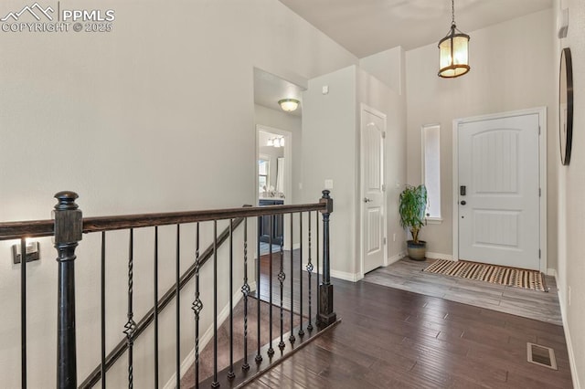 13124 Park Meadows Dr, Peyton, CO 80831 - foyer entrance featuring wood finished floors and baseboards