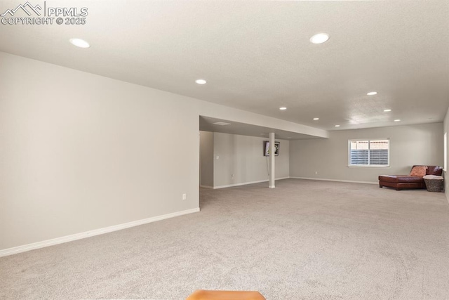 13124 Park Meadows Dr, Peyton, CO 80831 - basement featuring recessed lighting, light colored carpet, and baseboards