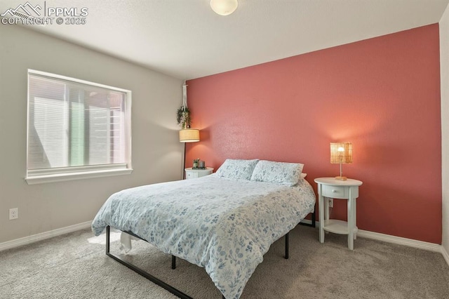 13124 Park Meadows Dr, Peyton, CO 80831 - carpeted bedroom featuring baseboards