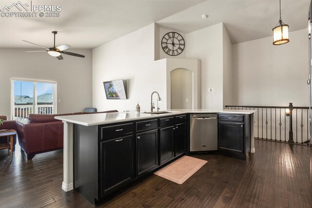 13124 Park Meadows Dr, Peyton, CO 80831 - kitchen featuring a sink, stainless steel dishwasher, open floor plan, a ceiling fan, and dark cabinetry