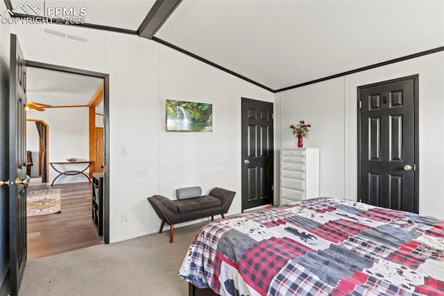 10635 Via Vaquaro Pt, Fountain, CO 80817 - bedroom with vaulted ceiling and carpet