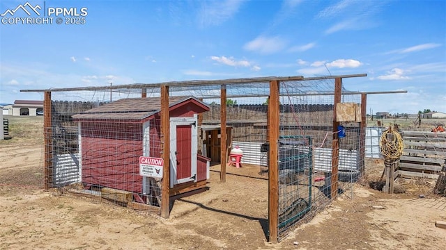 10635 Via Vaquaro Pt, Fountain, CO 80817 - view of play area featuring exterior structure and an outdoor structure