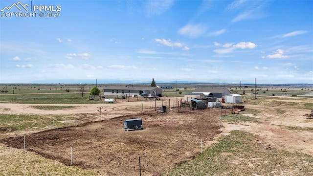 10635 Via Vaquaro Pt, Fountain, CO 80817 - view of yard featuring a view of rural / pastoral area, an outdoor structure, and a storage unit