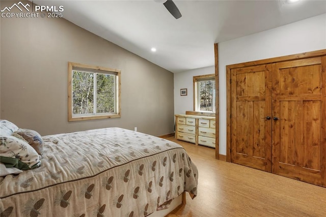 2747 County Road 61, Cripple Creek, CO 80813 - bedroom with light wood-type flooring, multiple windows, vaulted ceiling, recessed lighting, and a ceiling fan