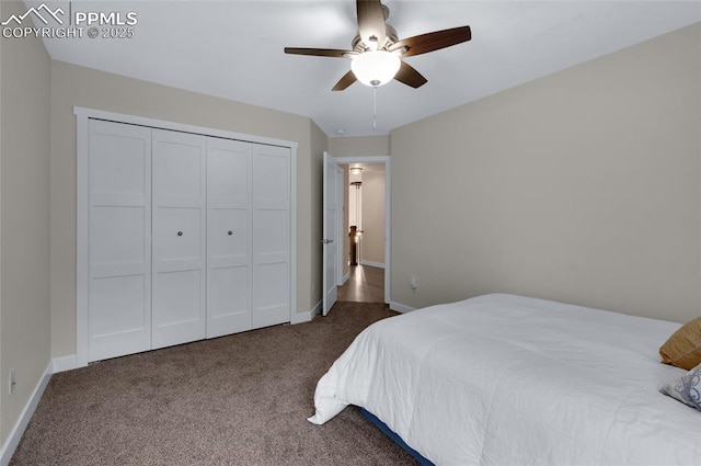 carpeted bedroom featuring baseboards, a closet, and ceiling fan