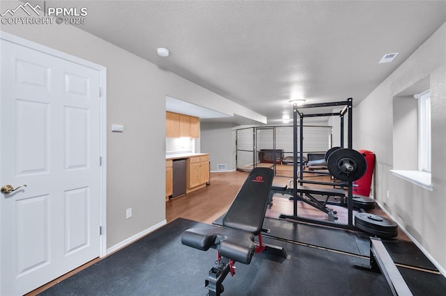 workout area with baseboards