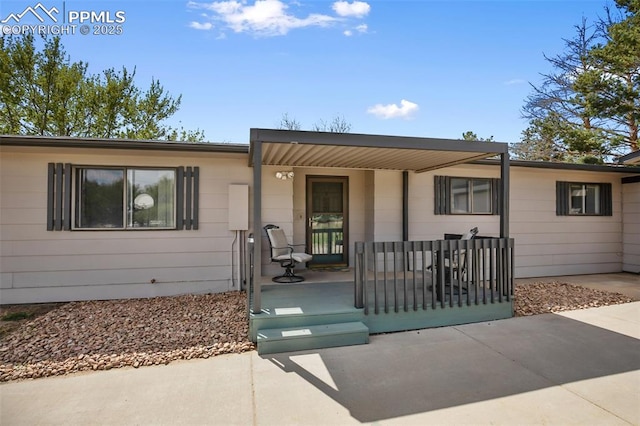 ranch-style home with covered porch