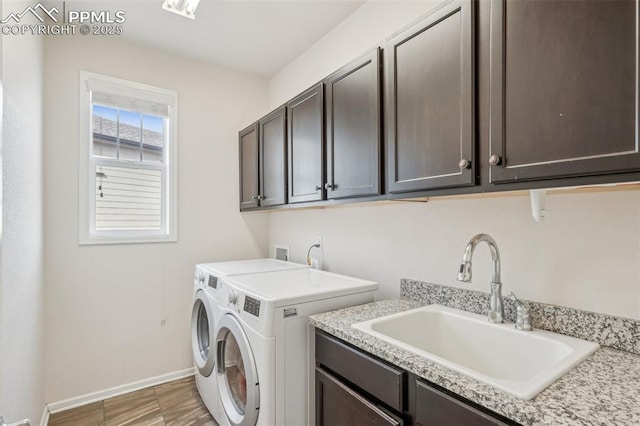 3197 Cool Meadow Pl, Castle Rock, CO 80104 - laundry area featuring cabinet space, separate washer and dryer, and baseboards